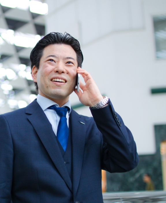 社員紹介一人目、事務系営業のODAの業務中の姿の写真