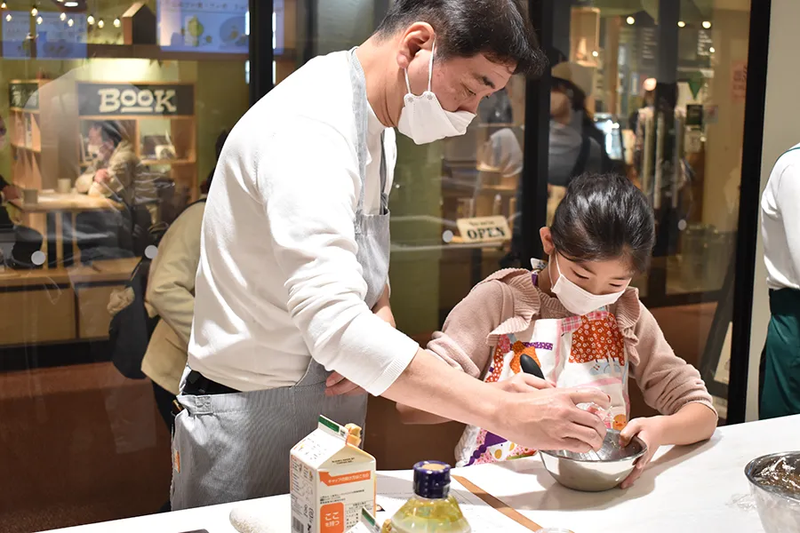 Parents and children having a cooking experience